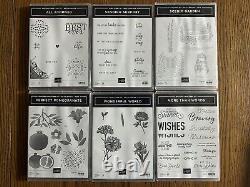Assortment of Stampin Up stamp sets with ink pads and ink